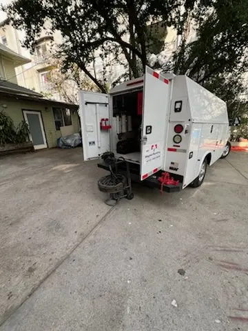 Magnet Plumbing service vehicle on-site for Grease Trap Cleaning in Topanga Park